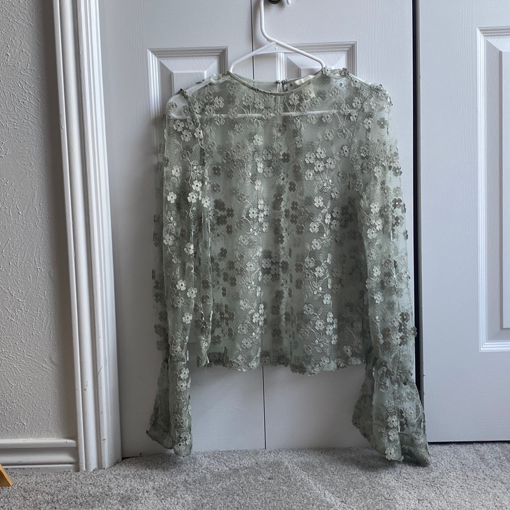 Cute Mesh green top. Have worn only once.